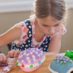 Grandma's sugar egg molds add nostalgic charm, perfect for crafting old fashioned sugar Easter eggs, a cherished family tradition.