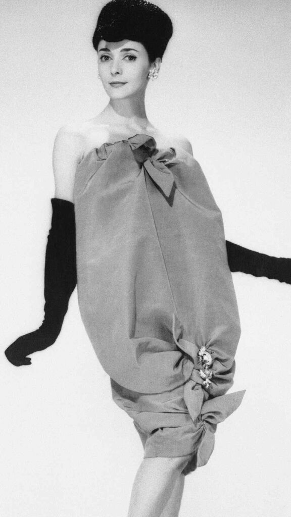 1950s fashion featuring Chanel's signature slim look