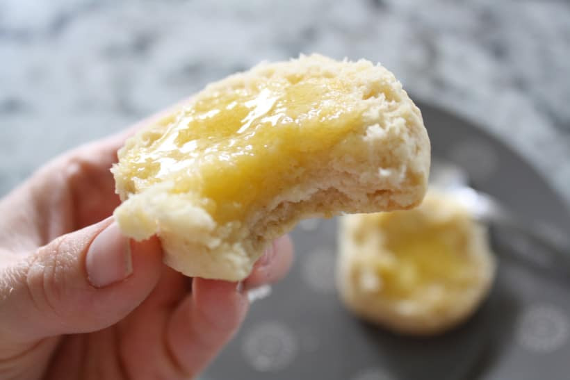 Homemade biscuits with butter and a knife