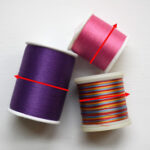 Stacked thread spools for vintage sewing machines