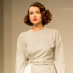 Model on stage at a student fashion show