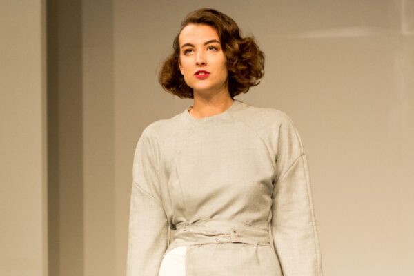 Model on stage at a student fashion show