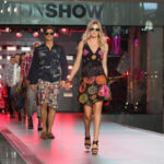 Models taking to the catwalk at Fashion Show Mall to showcase the latest attire and accessories.