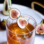 Fig Old Fashioned in rocks glass with fig garnish