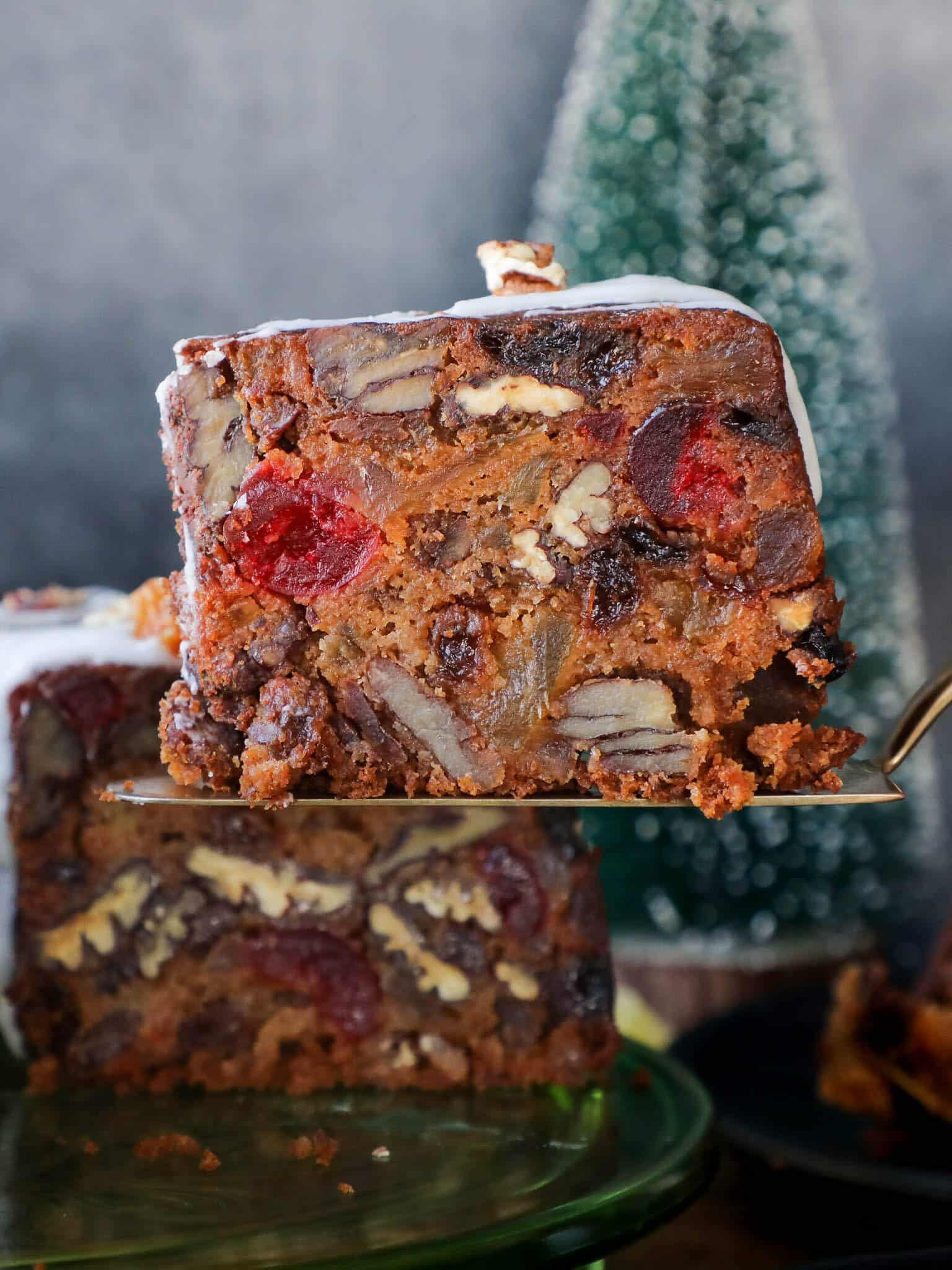 Fruitcake slice on cake server