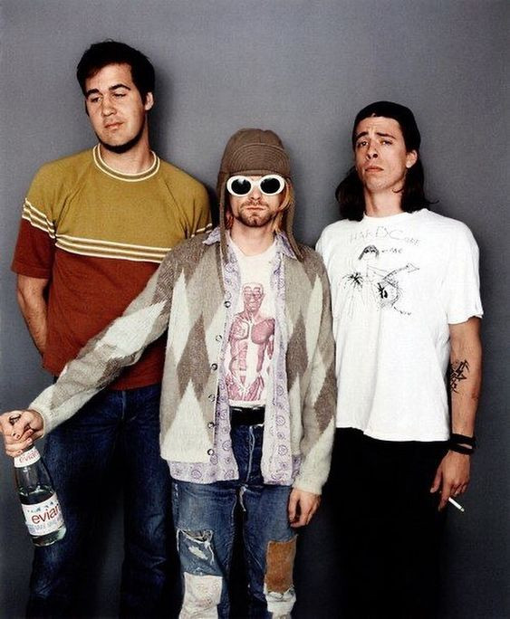 Members of Nirvana, embodying the grunge influence on 90s punk fashion