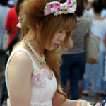 A Hime Gyaru style girl, showcasing elaborate hairstyle and clothing