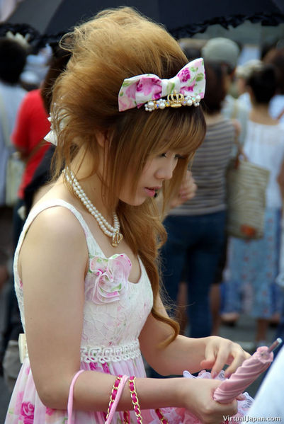 A Hime Gyaru style girl, showcasing elaborate hairstyle and clothing
