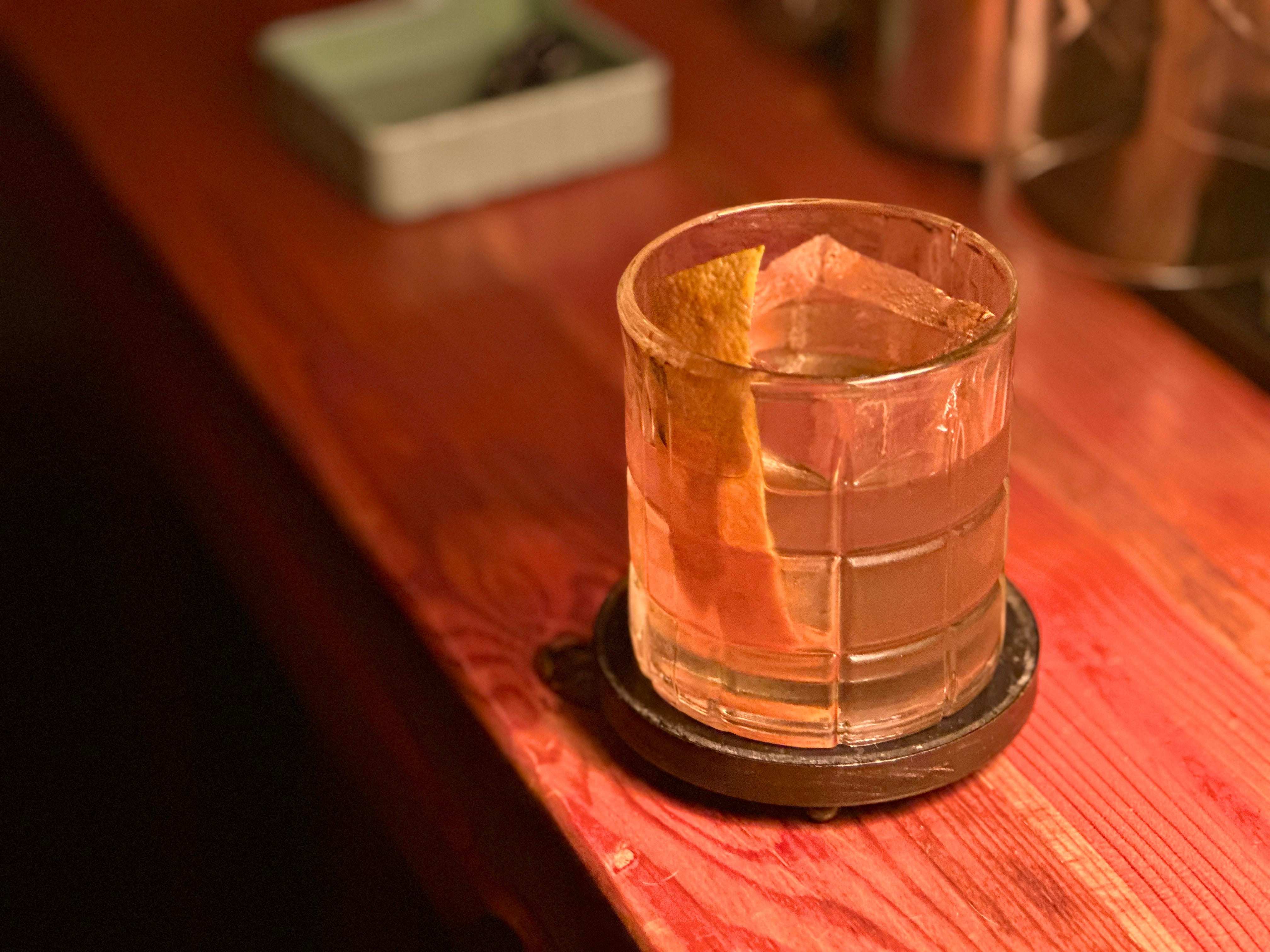 man enjoying a scotch old fashioned