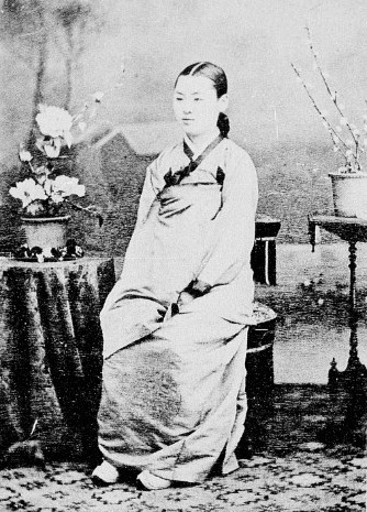 Young woman in traditional Korean dress.