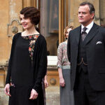 Lord Grantham in a classic tweed suit, embodying the 1920s country gentleman style with comfort and sophistication.