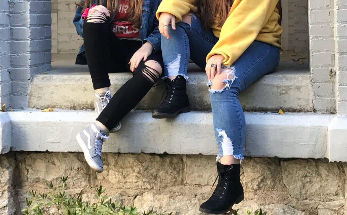 Two pairs of modern styled ripped jeans