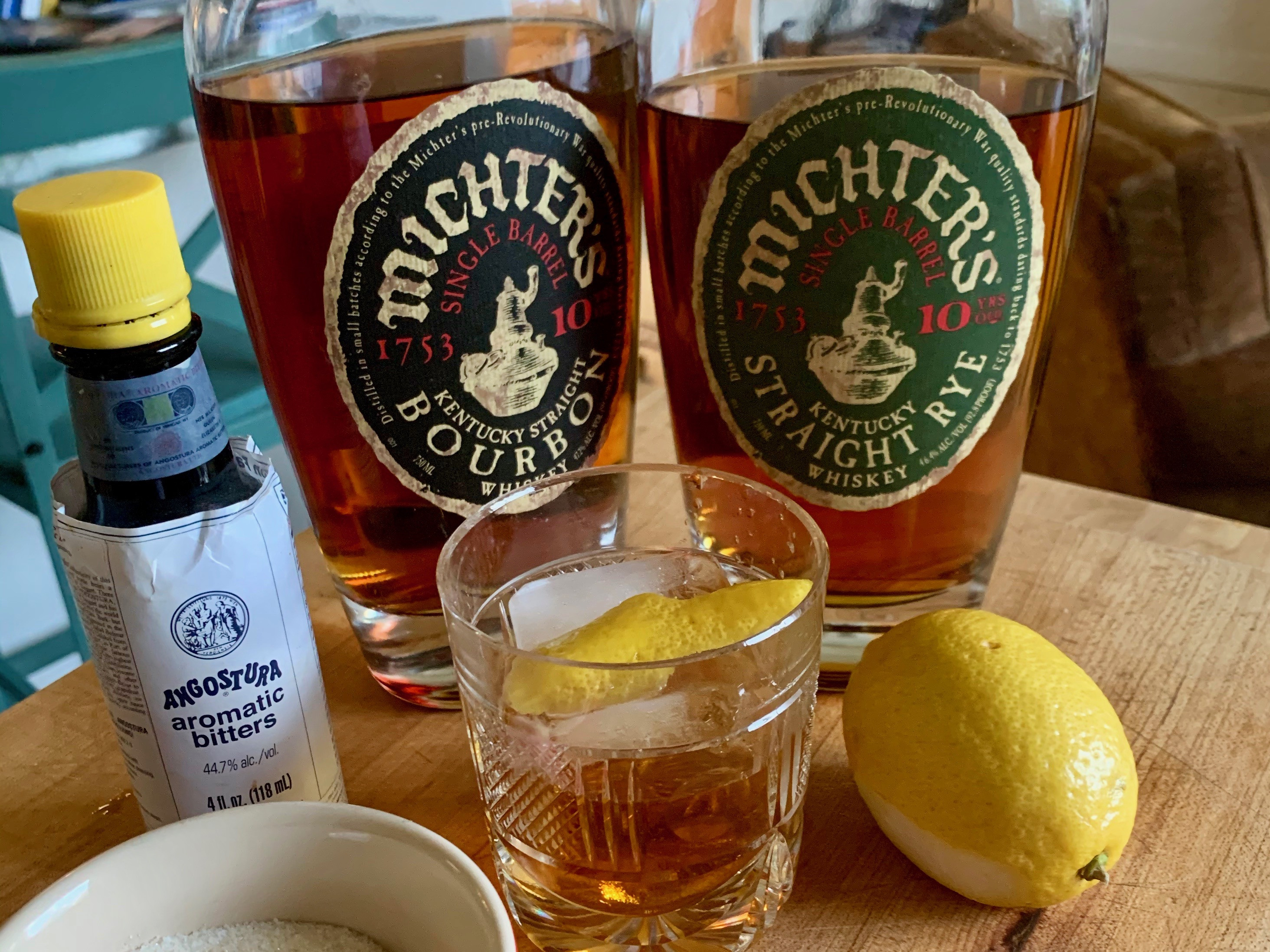 Old fashioned glass with a large ice cube