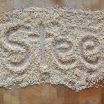Steel cut oats in a wooden bowl