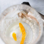 Muddling Sugar and Bitters for Irish Old Fashioned