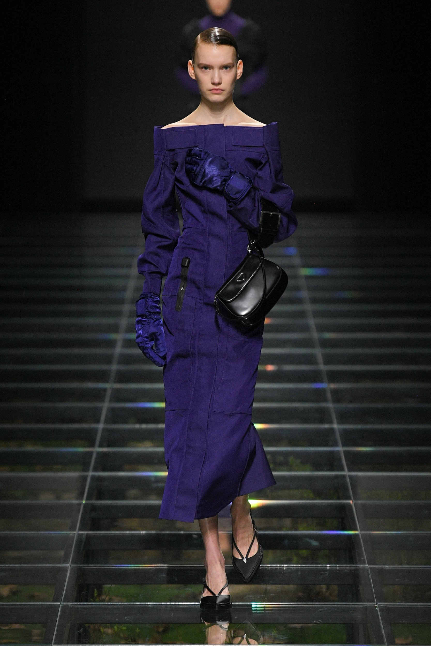 Model wearing Prada Fall 2024 collection reflecting current cultural trends