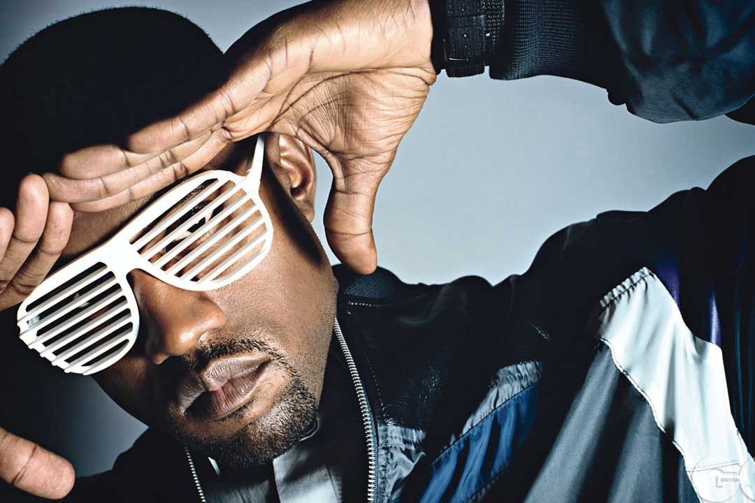 Kanye West wearing white Aviator style shutter shades