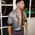 Man wearing a shirt with glitters
