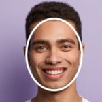 Man with oval face wearing square glasses
