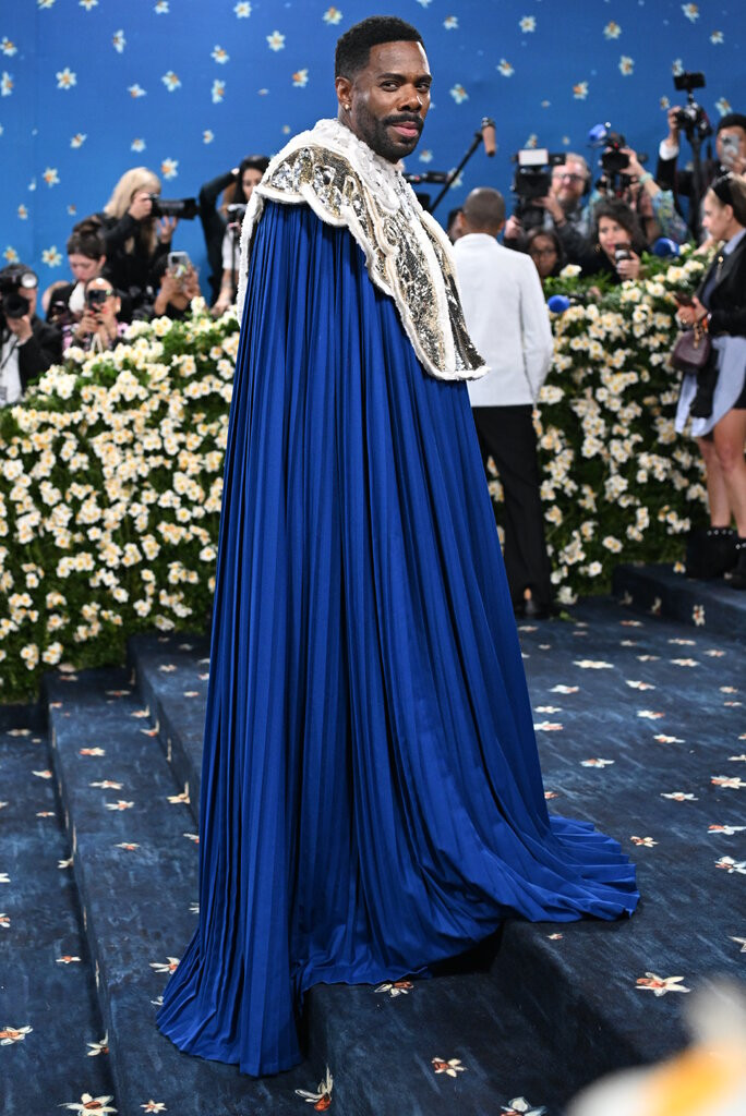 Colman Domingo in Valentino at the 2025 Met Gala, showcasing his interpretation of the theme with a royal blue cape and silver collar.