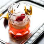 Close up shot of an old fashioned cocktail in a low ball glass.
