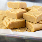 Old Fashioned Peanut Butter Fudge stacked on a tray