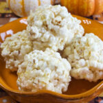 Old Fashioned Popcorn Balls showcasing a sweet, sticky syrup coating.