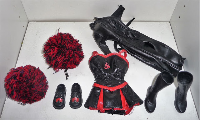 Kitty's cheerleading outfit with peeling pleather