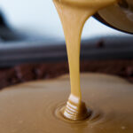 Bowl of caramel frosting.