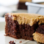 Old fashioned caramel icing covers chocolate cake flawlessly