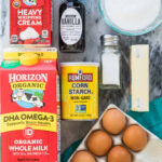 Overhead view of ingredients including cream, milk, corn starch, and more.