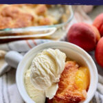 Top view of a white bowl filled with peach cobbler and ice creaam with text on image for Pinterest.