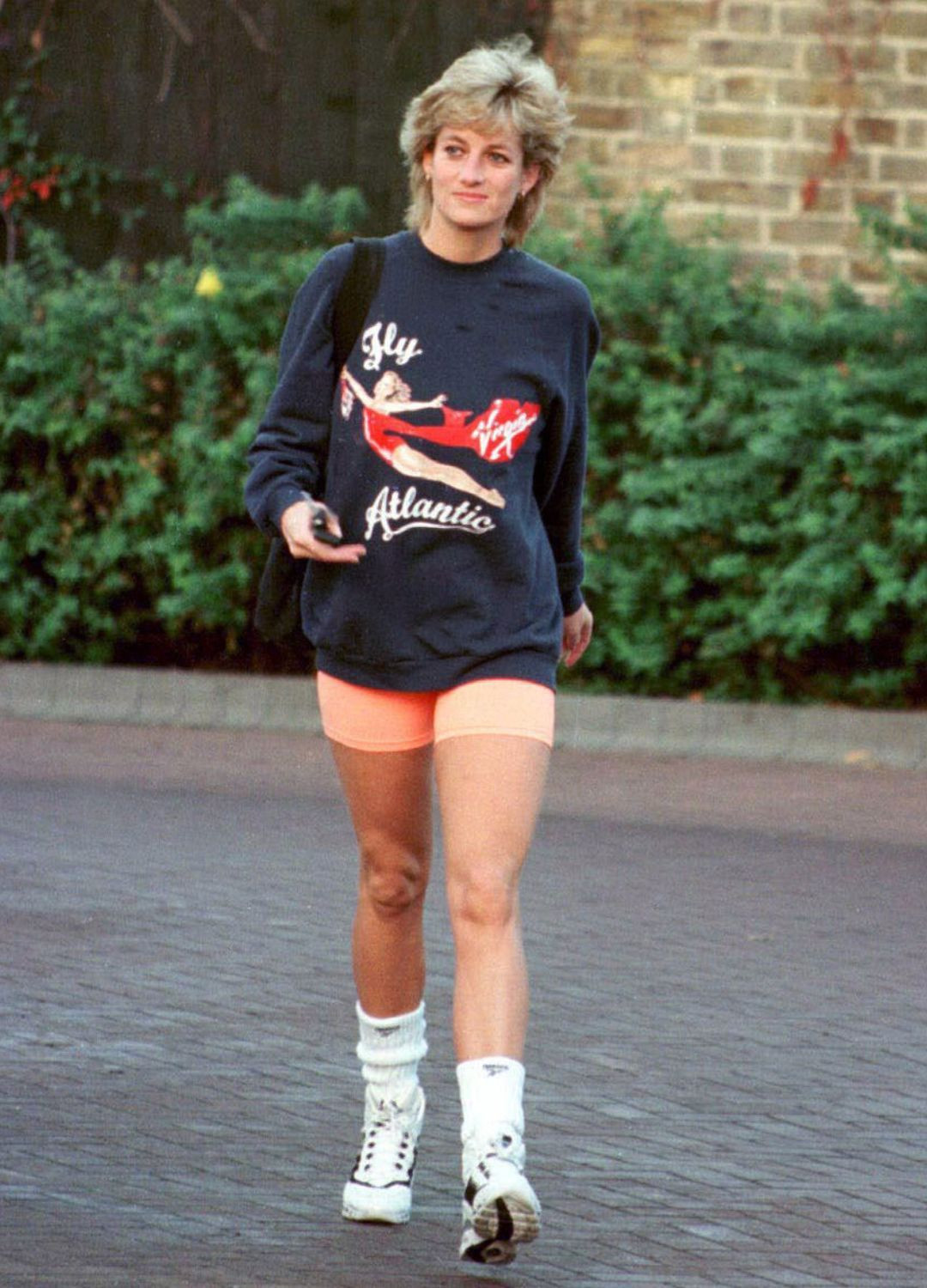 Princess Diana, Princess of Wales, wearing Virgin Atlantic sweatshirt, leaves Chelsea Harbour Club, London in November, 1995. (Photo by Anwar Hussein/WireImage)