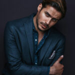 Man in distinctive personal style attire showing individuality and brand identity through clothing.