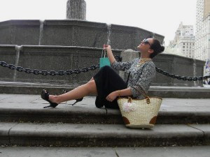 Audrey Hepburn inspired photoshoot at the Plaza Hotel, featuring a model in a black dress and pearls