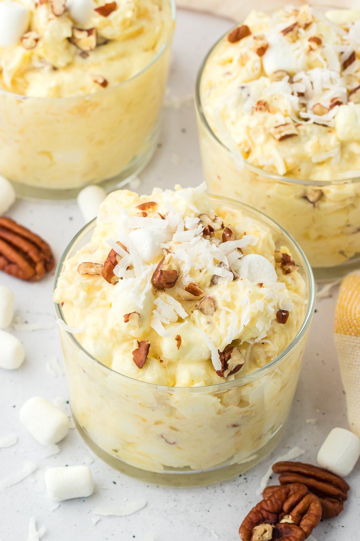 Three trifle dishes with pineapple fluff