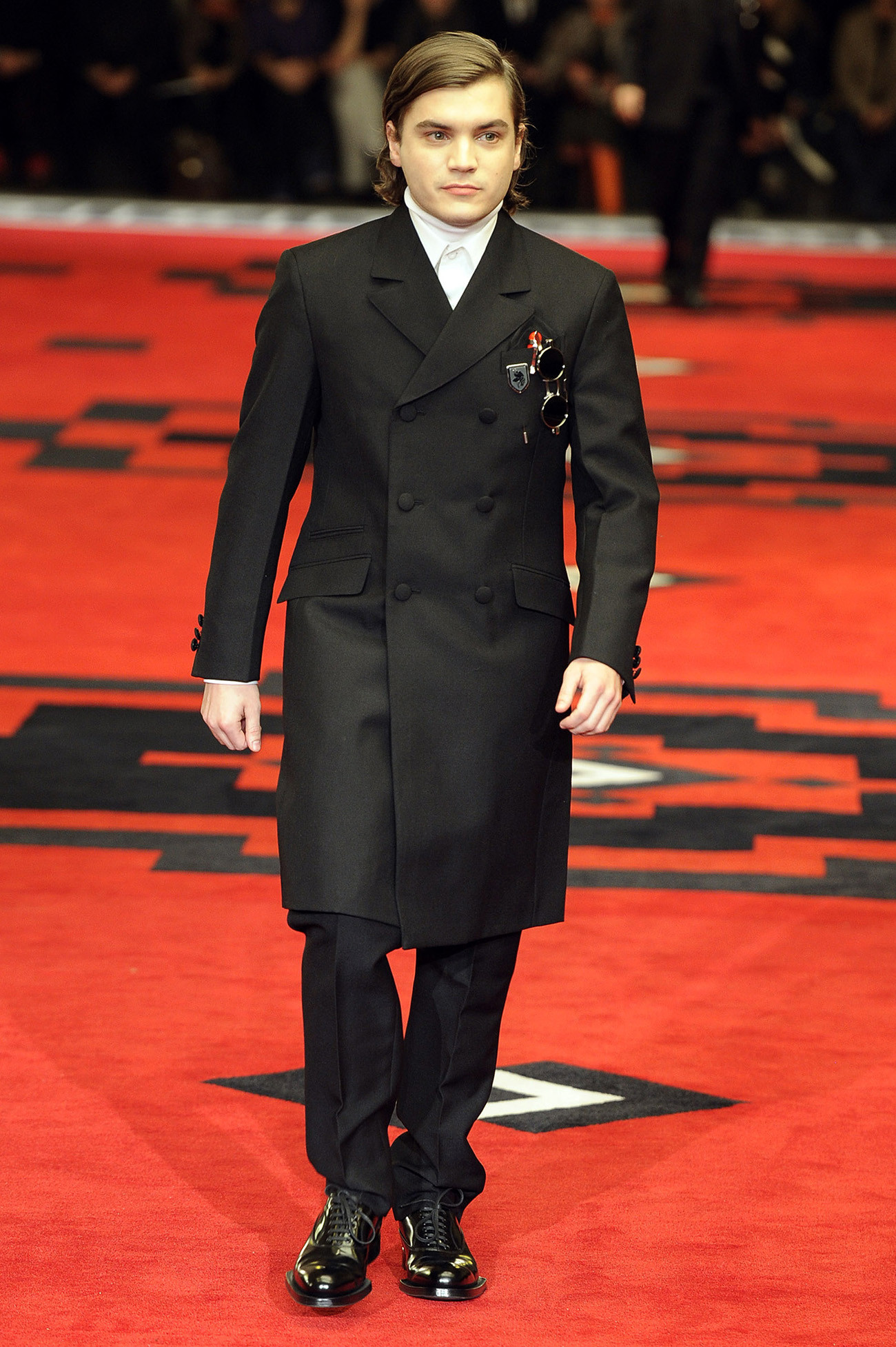 Emile Hirsch confidently presenting Prada's Fall/Winter 2012 collection during Milan Menswear Fashion Week.