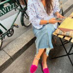 Street style image in Milan featuring Friulane shoes, a popular footwear choice.