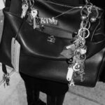 Man with stylish keychain attached to belt loop