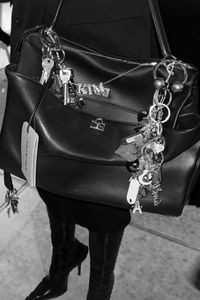 Man with stylish keychain attached to belt loop