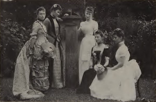 Scrope sisters, late 1880s, showcase middle-of-the-road fashion with sheer fabrics, loose-cut bodices, and medium-full skirts, reflecting the aesthetic style of the era.