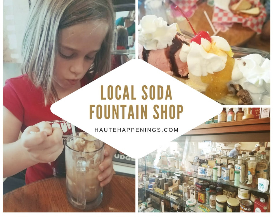 An old-fashioned soda fountain shop with classic decor and a long counter, complete with swivel stools and vintage signage, capturing the charm of a bygone era.