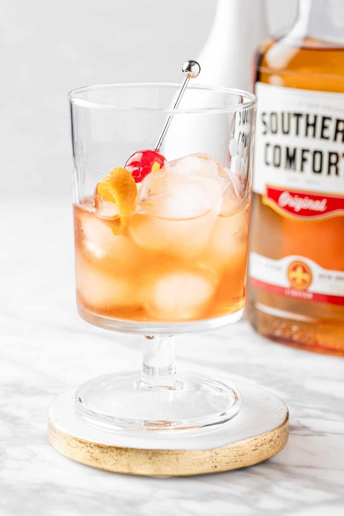 Southern Comfort Old Fashioned with orange peel and cherry garnish