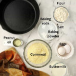 Ingredients for cornbread including cornmeal, flour and buttermilk.
