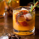 Side angled photo of spiced honey bourbon old fashioned