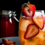 Strawberry Old Fashioned with strawberry garnish
