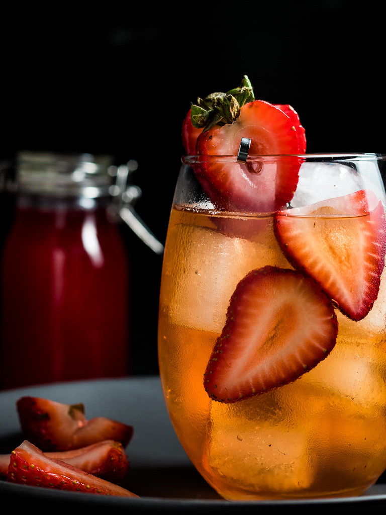 Strawberry Old Fashioned with strawberry garnish