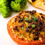 Old-fashioned stuffed tomatoes with breadcrumbs and herbs