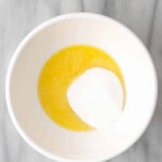 Sugar butter mixing for old fashioned sweet cornbread recipe