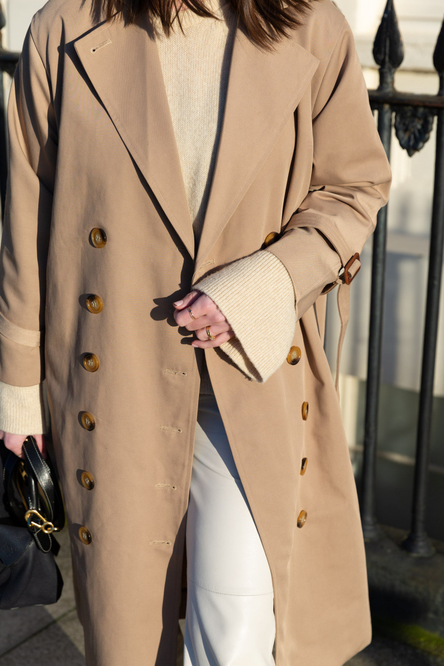 Man wearing a stylish beige trench coat